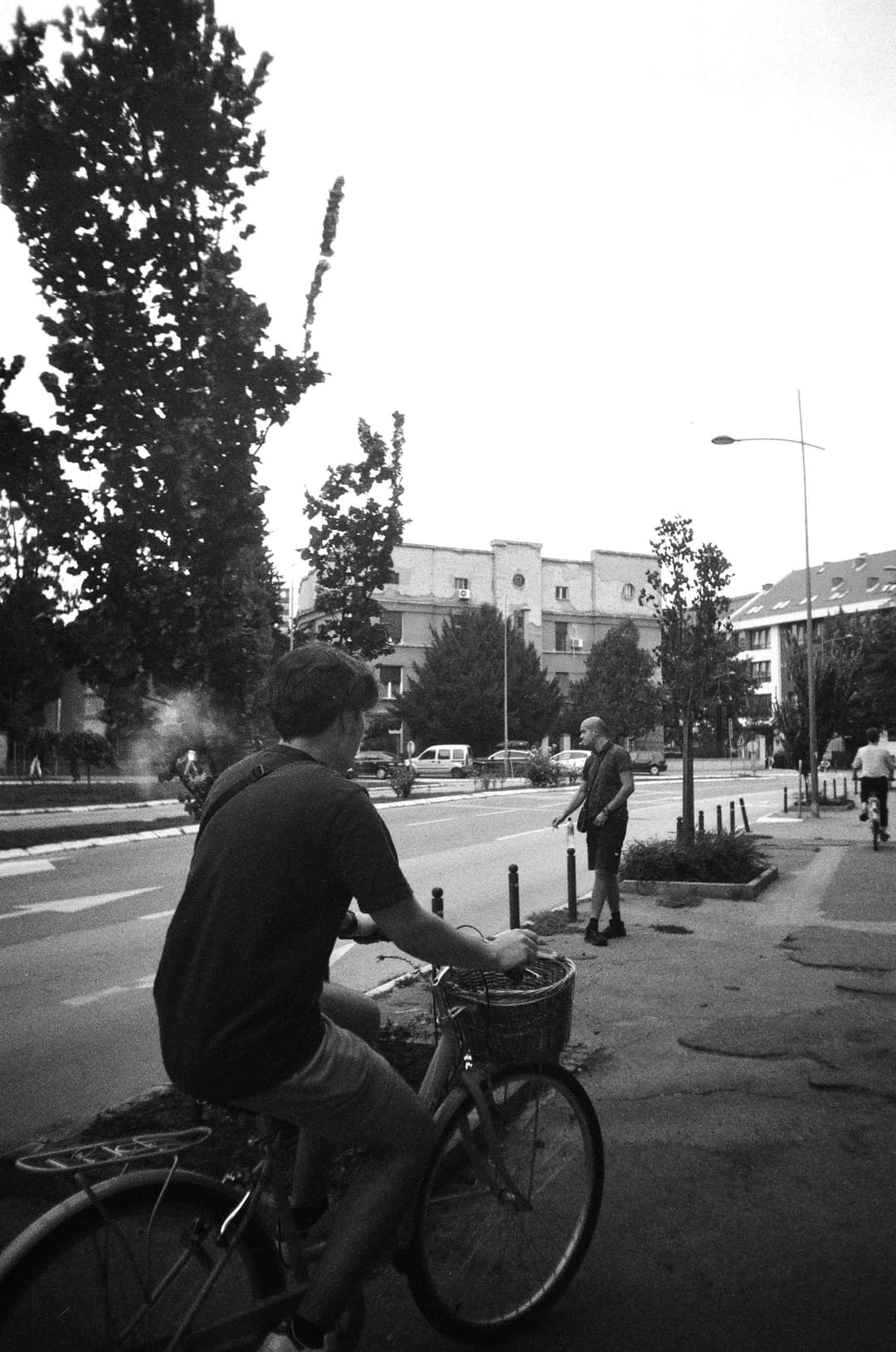 A person riding a bike through a city
